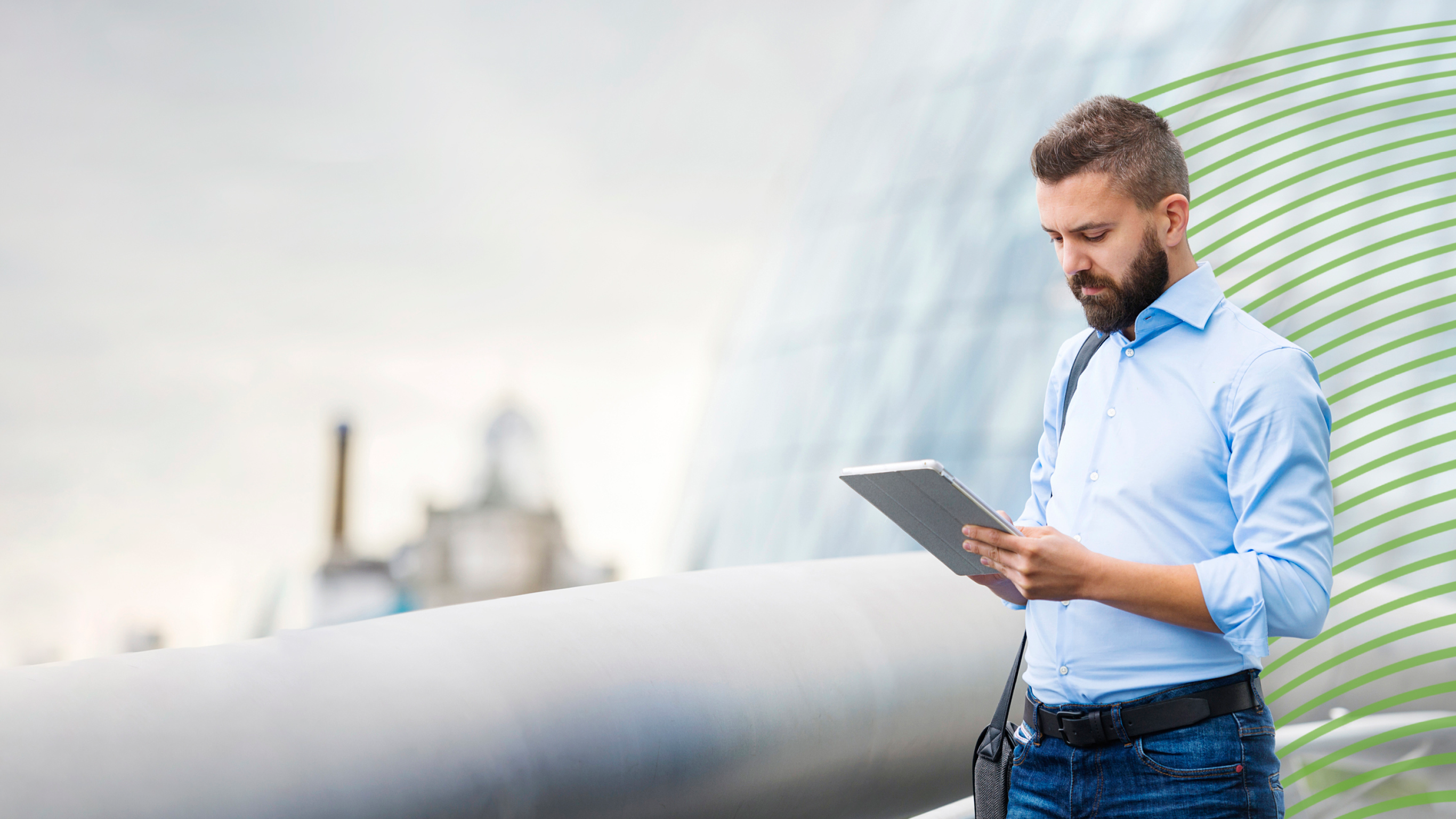 Handsome young man with tablet in the streets of London