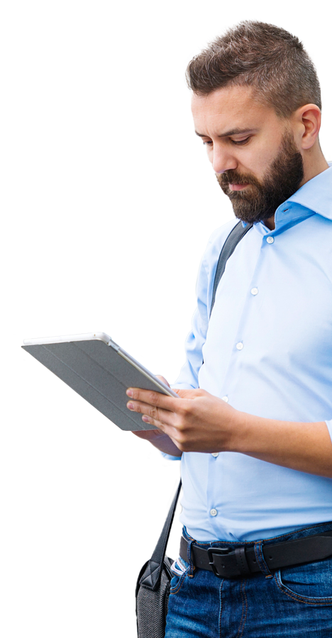 Handsome young man with tablet in the streets of London