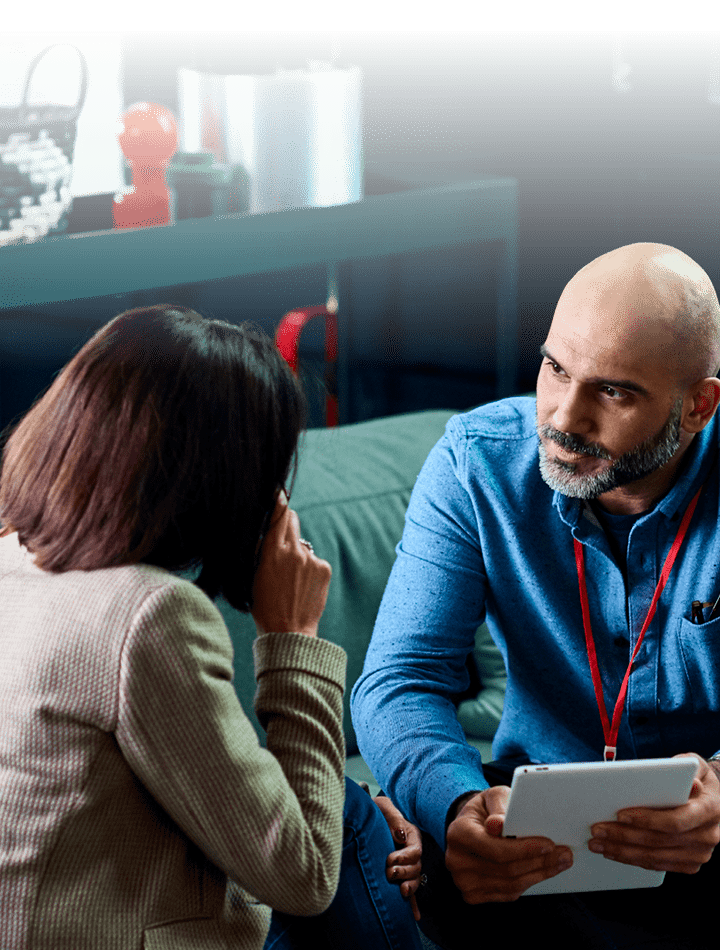 Business people talking in modern office during meeting